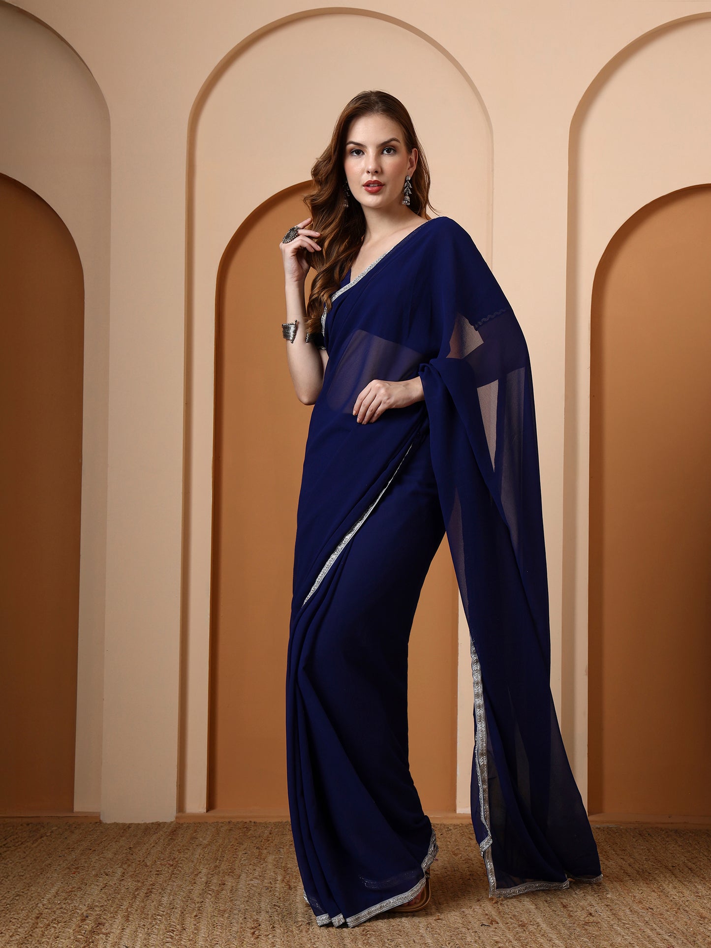 Blue Georgette Embellished Classic Saree